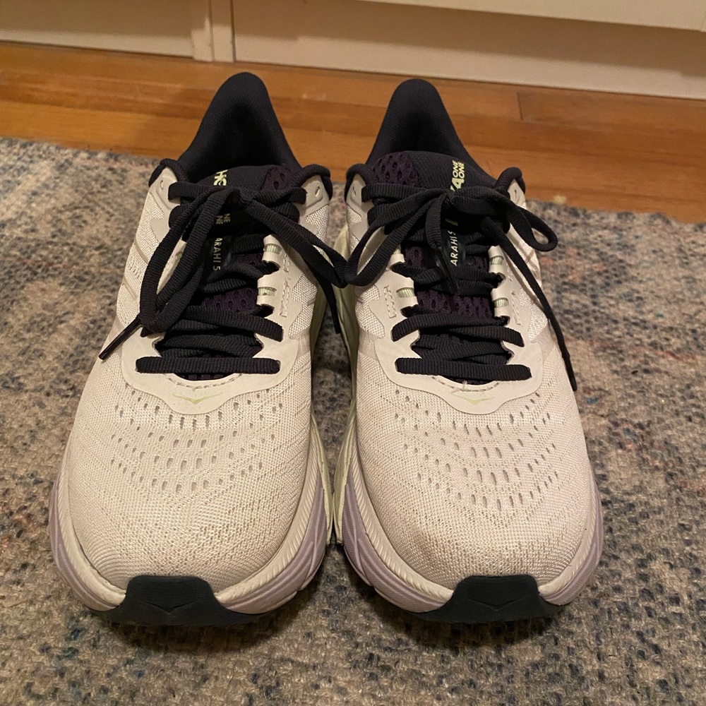 Hoka ones in light green and light purple navy color way